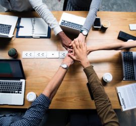 Team mates working together at a desk