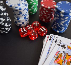 Close-up poker chips, dice, cards