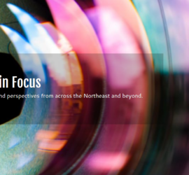 Banner for the NEBD Hub's News page - A camera lens closeup