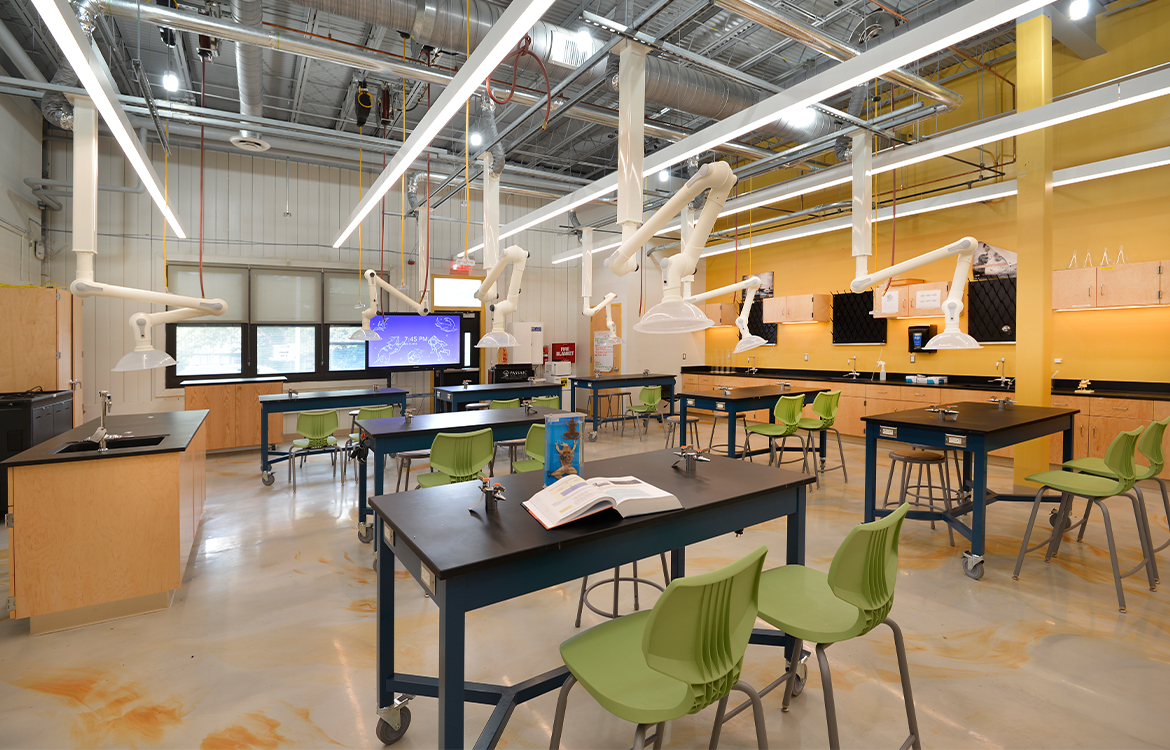 interior featuring a computer lab, lab tables and stools