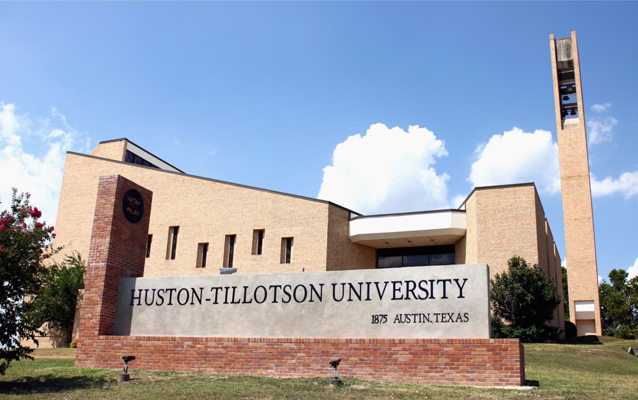 A photo of the main sign at the entryway for Huston-Tillotson University