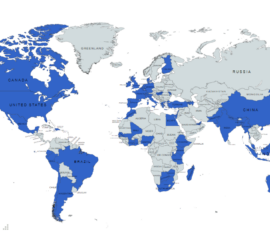 A grey map of the world, with the countries the NEBDHub reaches highlighted in blue. These include China, India, Brazil, Chile, Spain, Nigeria, Kenya, the Philippines, and more